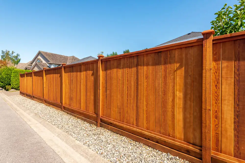 Stained wood privacy fence