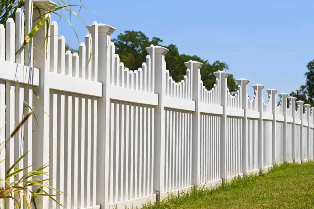 White vinyl scalloped picket fence